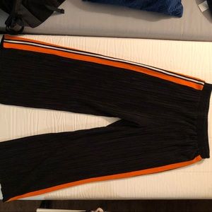 Black and orange side strip pleated pants